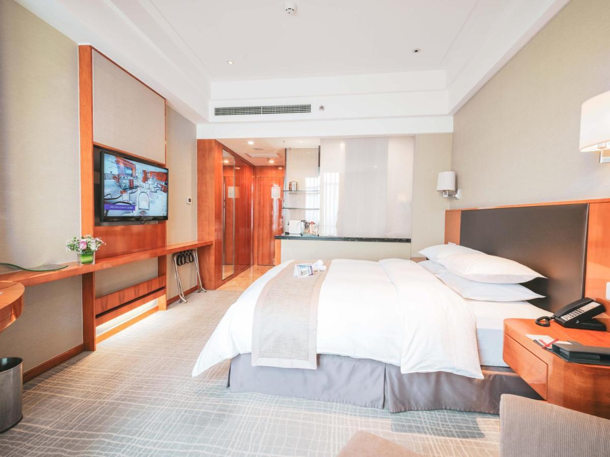 Ramada Plaza Shanghai Pudong Airport - 3 Mins To Pvg Depature Floor & Check Entrance With Hotel Shuttle Екстериор снимка