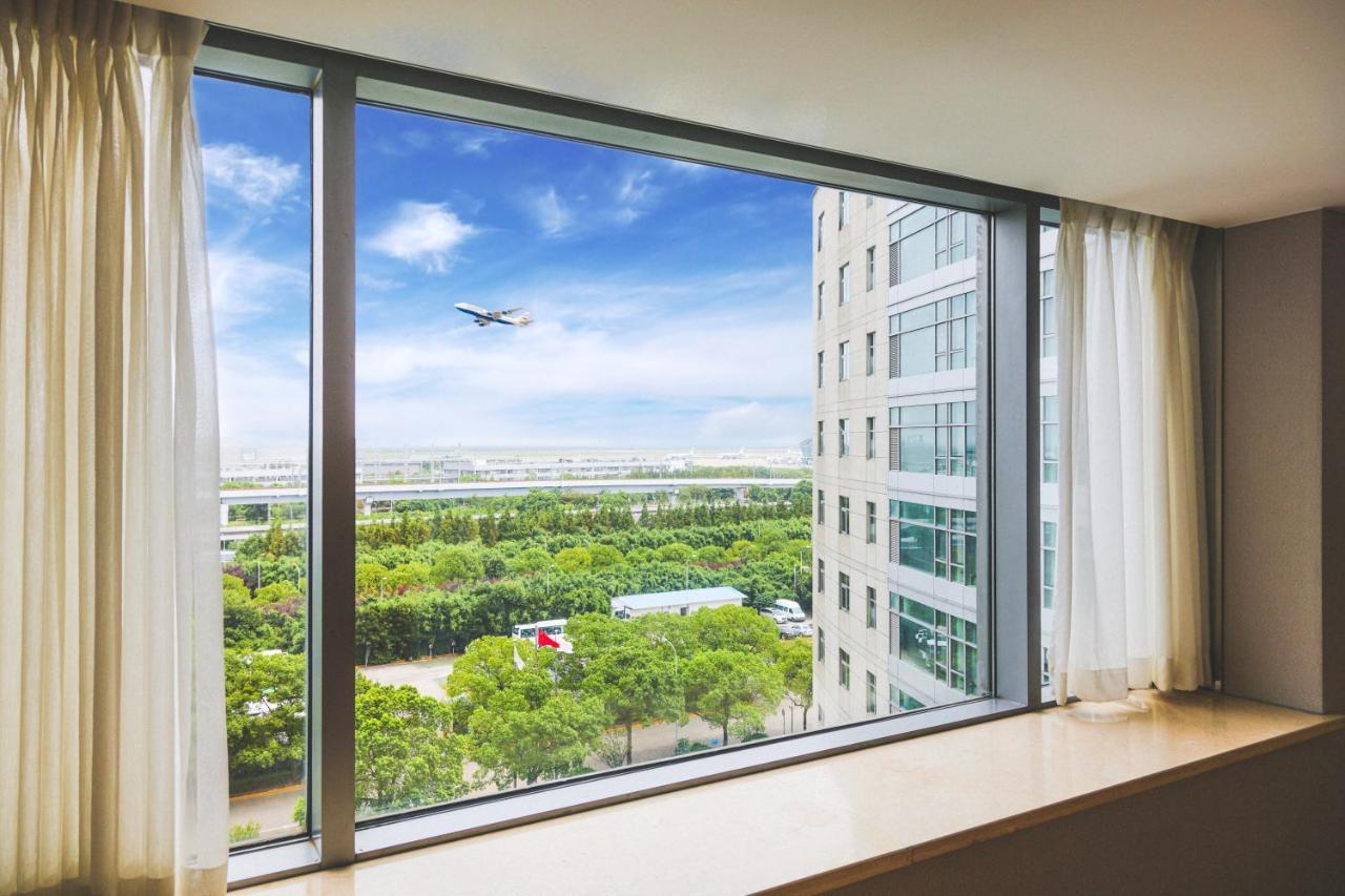 Ramada Plaza Shanghai Pudong Airport - 3 Mins To Pvg Depature Floor & Check Entrance With Hotel Shuttle Екстериор снимка